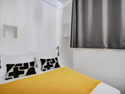 Un ou plusieurs lits dans un hébergement de l'établissement Cosy appt - Sentier Les Halles - Mobility lease