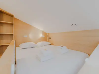 Un ou plusieurs lits dans un hébergement de l'établissement Beautiful Studio - 2P - Invalides Bon Marché