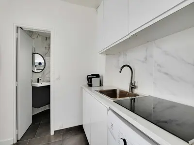 Cuisine ou kitchenette dans l'établissement Studio 2pers - 20th ard - Mobility lease