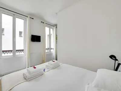 Un ou plusieurs lits dans un hébergement de l'établissement Studio 2pers - 20th ard - Mobility lease