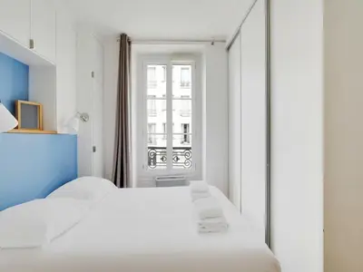 Un ou plusieurs lits dans un hébergement de l'établissement Comfortable Apt - 1BD 3P - Commerce Montparnasse