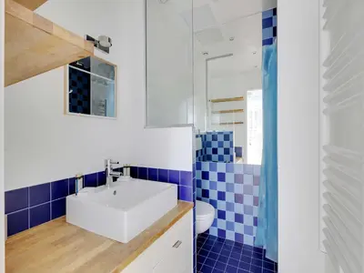 Salle de bains dans l'établissement Comfortable Apt - 1BD 3P - Commerce Montparnasse