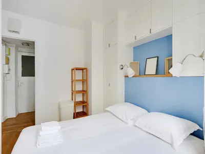 Un ou plusieurs lits dans un hébergement de l'établissement Comfortable Apt - 1BD 3P - Commerce Montparnasse
