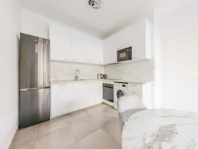 Cuisine ou kitchenette dans l'établissement Charming apartment - Levallois-Perret - Mobility Lease