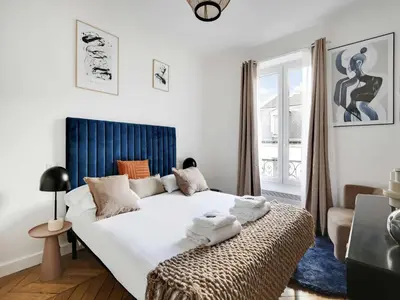 Un ou plusieurs lits dans un hébergement de l'établissement Charming flat 1BDR 2P - Voltaire Bastille