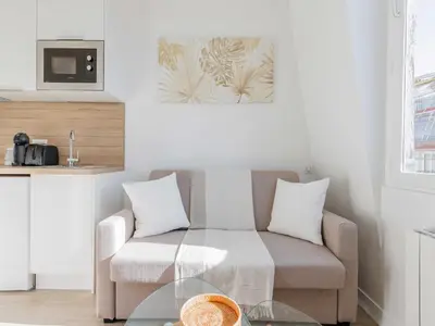 Coin salon dans l'établissement Cosy studio - Bastille - Mobility lease