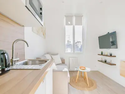 Cuisine ou kitchenette dans l'établissement Cosy studio - Bastille - Mobility lease