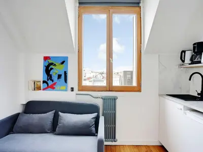 Cuisine ou kitchenette dans l'établissement Cosy appt 1BDR 2P - Arc de Triomphe
