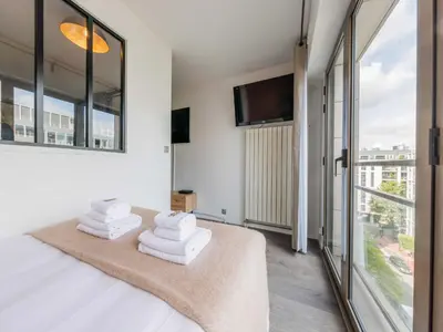 Un ou plusieurs lits dans un hébergement de l'établissement Charming studio - Levallois-Perret - Mobility lease