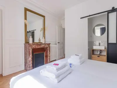 Un ou plusieurs lits dans un hébergement de l'établissement Spacious apartment 3BDR 6P - Neuilly sur Seine