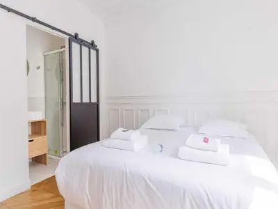 Un ou plusieurs lits dans un hébergement de l'établissement Spacious apartment 3BDR 6P - Neuilly sur Seine