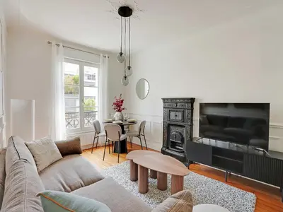 Coin salon dans l'établissement Charming 1BDR - Jardin des plantes Austerlitz