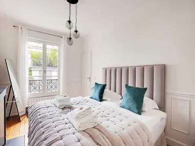 Un ou plusieurs lits dans un hébergement de l'établissement Charming 1BDR - Jardin des plantes Austerlitz