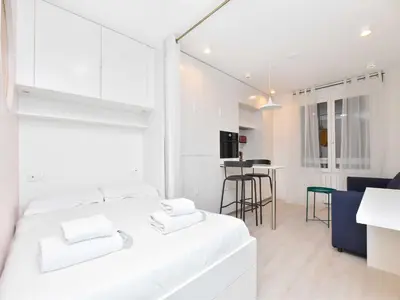 Un ou plusieurs lits dans un hébergement de l'établissement Super Studio lumineux- Gambetta BAIL MOBILITE