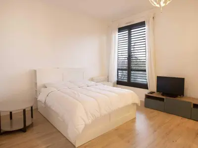Un ou plusieurs lits dans un hébergement de l'établissement Super apartment 2P Av Foch - Dauphine - MOBILITY LEASE