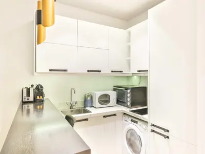 Cuisine ou kitchenette dans l'établissement Magnificent studio - 2P - Place Victor Hugo