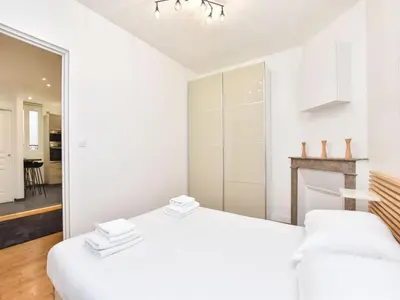 Un ou plusieurs lits dans un hébergement de l'établissement Modern flat - 1BR 4P - Puteaux La Défense