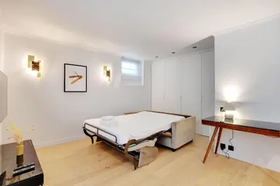 Un ou plusieurs lits dans un hébergement de l'établissement COZY Studio 2P - Champ de Mars - Military School