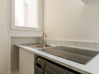 Cuisine ou kitchenette dans l'établissement Charming appt 2 BDR 4P Sacré-Coeur
