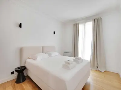 Un ou plusieurs lits dans un hébergement de l'établissement Charming apt - 2BR 5P - Sacré-Cœur Montmartre