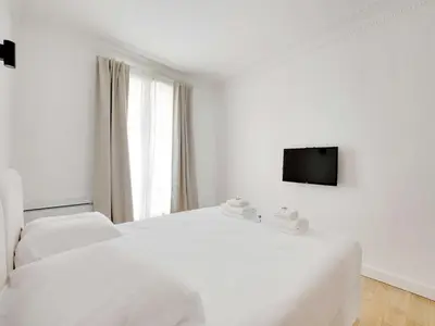 Un ou plusieurs lits dans un hébergement de l'établissement Charming apt - 2BR 5P - Sacré-Cœur Montmartre