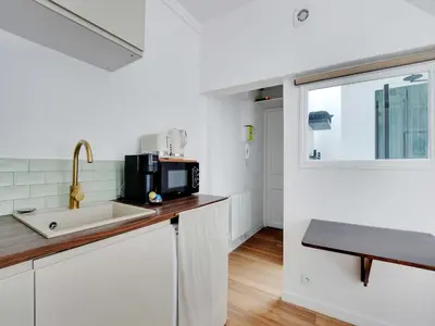 Cuisine ou kitchenette dans l'établissement Studio COSY - 2P - Saint-Augustin