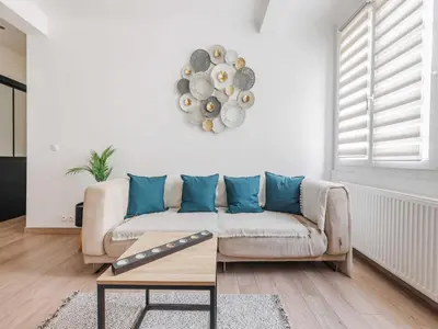 Coin salon dans l'établissement Charming apartment near Canal de l'Ourcq - Mobility lease