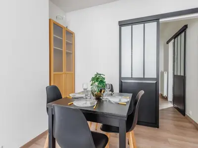 Coin salon dans l'établissement Charming apartment near Canal de l'Ourcq - Mobility lease