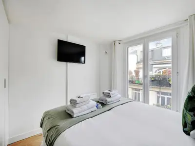 Un ou plusieurs lits dans un hébergement de l'établissement Perfect appt cosy 2P 1 BDR - TERNES NIEL