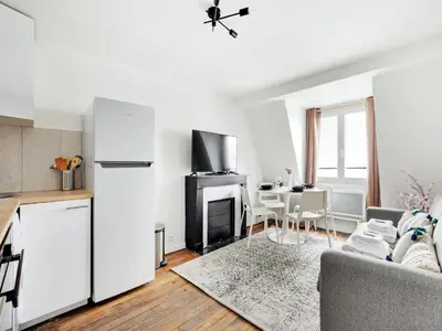 Cuisine ou kitchenette dans l'établissement Cosy apartment - 2BD 4P - Canal St-Martin