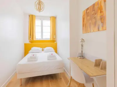 Un ou plusieurs lits dans un hébergement de l'établissement Magnificent apartment -2BR 4P - Porte Maillot