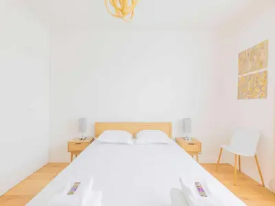 Un ou plusieurs lits dans un hébergement de l'établissement Magnificent apartment -2BR 4P - Porte Maillot