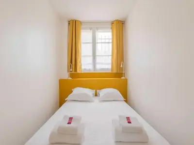 Un ou plusieurs lits dans un hébergement de l'établissement Magnificent apartment -2BR 4P - Porte Maillot