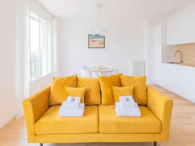 Coin salon dans l'établissement Magnificent apartment -2BR 4P - Porte Maillot