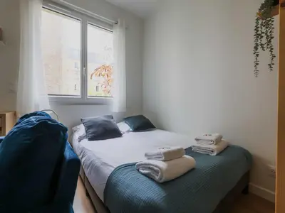 Un ou plusieurs lits dans un hébergement de l'établissement Charming studio - 2P- Neuilly-sur-Seine