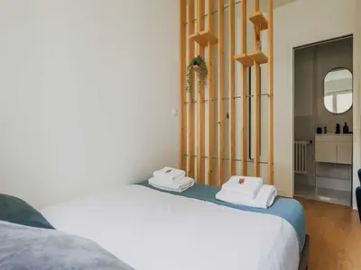 Un ou plusieurs lits dans un hébergement de l'établissement Charming studio - 2P- Neuilly-sur-Seine