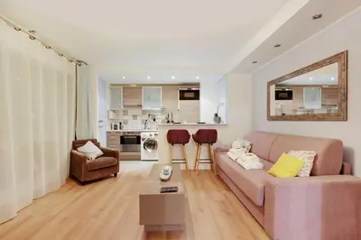 Coin salon dans l'établissement Cozy Studio - Villette-2P - Mobility Lease