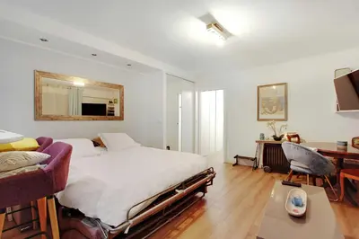 Un ou plusieurs lits dans un hébergement de l'établissement Cozy Studio - Villette-2P - Mobility Lease