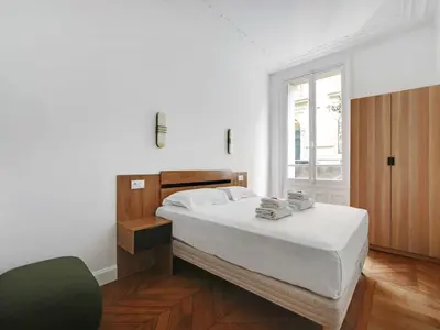 Un ou plusieurs lits dans un hébergement de l'établissement Very elegant apartment 3BDR 6P - Mairie de Neuilly