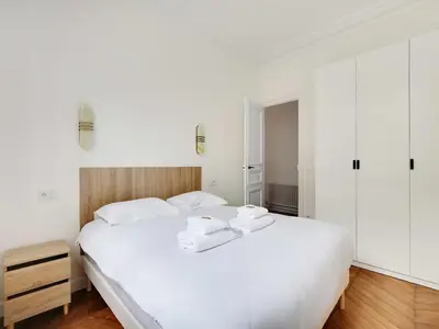 Un ou plusieurs lits dans un hébergement de l'établissement Very elegant apartment 3BDR 6P - Mairie de Neuilly