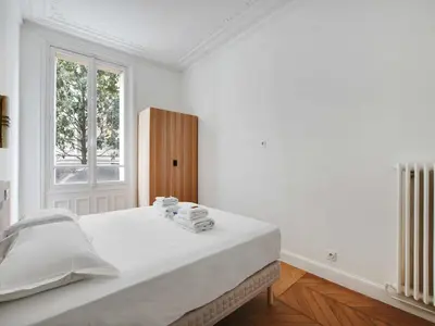 Un ou plusieurs lits dans un hébergement de l'établissement Very elegant apartment 3BDR 6P - Mairie de Neuilly