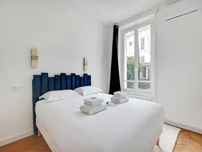 Un ou plusieurs lits dans un hébergement de l'établissement Very elegant apartment 3BDR 6P - Mairie de Neuilly