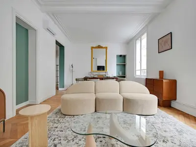 Coin salon dans l'établissement Very elegant apartment 3BDR 6P - Mairie de Neuilly