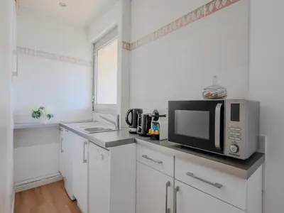 Cuisine ou kitchenette dans l'établissement Cosy Studio- 4P - République