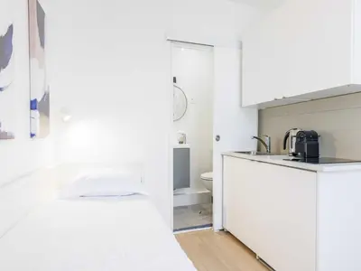 Cuisine ou kitchenette dans l'établissement Charming Cosy Studio -1P - Opéra Garnier