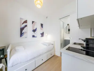 Cuisine ou kitchenette dans l'établissement Charming Cosy Studio -1P - Opéra Garnier