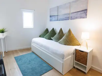 Un ou plusieurs lits dans un hébergement de l'établissement Charming studio - 9eme arrd 2P - Grands Boulevards