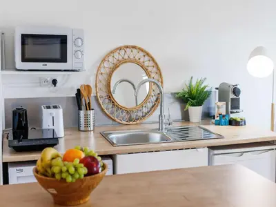 Cuisine ou kitchenette dans l'établissement Charming studio - 9eme arrd 2P - Grands Boulevards