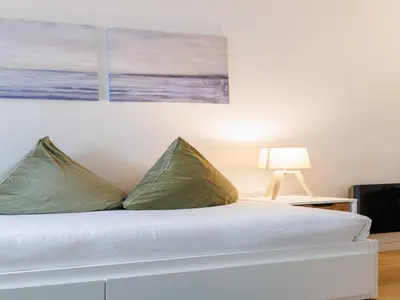 Un ou plusieurs lits dans un hébergement de l'établissement Charming studio - 9eme arrd 2P - Grands Boulevards