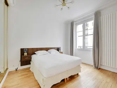 Un ou plusieurs lits dans un hébergement de l'établissement Exceptional apartment - 3BD 6P - Trocadéro